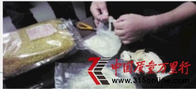 10月17日，水生動物防疫檢疫站高級工程師鑒定魚翅真假。記者 曾韌 攝